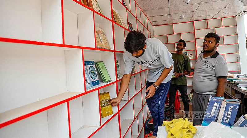 Books begin to fill the shelves of stalls at the fairgrounds in Suhrawardy Udyan as the Amar Ekushey Book Fair prepares to open for an 18-day run this year. Photo: Mahmud Zaman Ovi