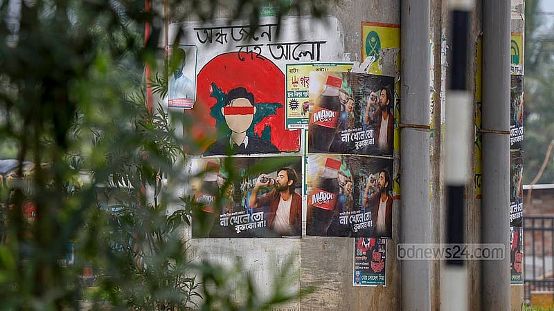 An artwork inspired by the Tagore song “Ondhojone Deho Alo, Mritojone Deho Pran” was painted on a pillar of the Kalshi Flyover. The beauty of the artworks done following the political changeover in the country has been despoiled by posters. Photo: Mahmud Zaman Ovi