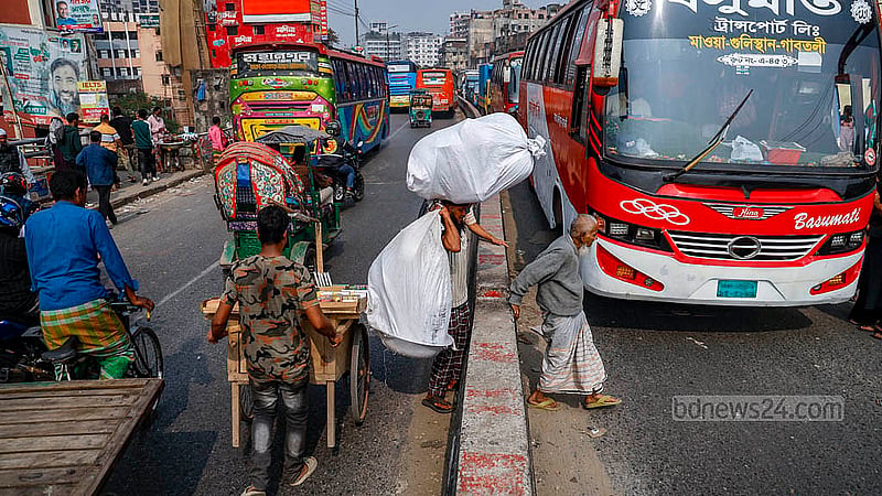 Although stairs exist on both sides of the Babu Bazar Bridge, they are not used properly. Most people use the stairs on one side to access the bridge and then cross the roadway to the other side, risking accidents, while no one is monitoring the situation. Photo: Mahmud Zaman Ovi