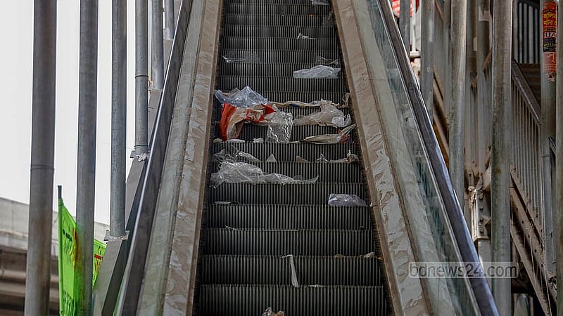 Trash has accumulated on the non-functioning escalator at the Tejgaon College end of the eye-catching Farmgate footbridge. Photo: Mahmud Zaman Ovi