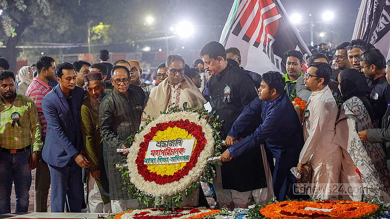 Nazmul Hossain, director general of the Directorate General of Health Education, pays tribute at the Shaheed Minar in the early hours of Feb 21, 2026.Photo: Mahmud Zaman Ovi