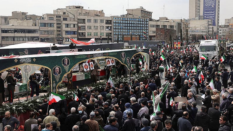 People attend a funeral ceremony for the Iranian military commanders who were killed in strikes, amid the U.S.-Israeli conflict with Iran, in Tehran, Iran, March 11, 2026.  Photo: Reuters