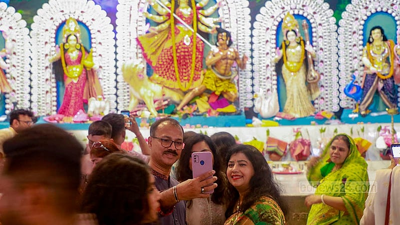 Several Hindu devotees took pictures with the idol of Goddess Durga after seeking her blessings on Thursday, Oct 10, 2024.