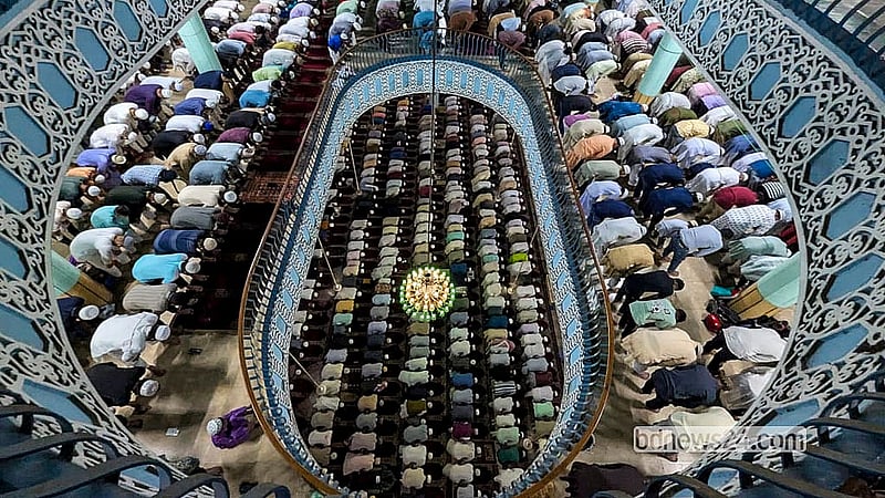 Devotees attend the first Eid-ul-Fitr congregation at Baitul Mukarram National Mosque on Saturday morning. Photo: Abdullah Al Momin