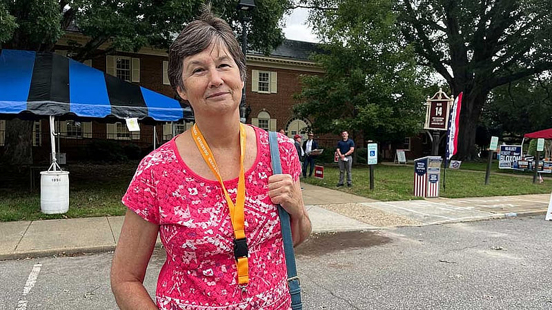 Jan Callaway, a Republican poll watcher, poses for a picture outside the early voting location in Virginia Beach, Virginia, US, Oct 2, 2025. REUTERS/Nathan Layne