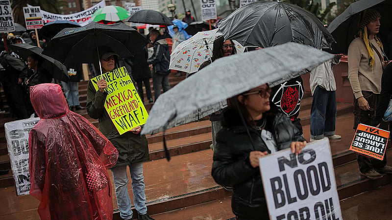 People protest against the US strikes on Venezuela and the capture of Venezuelan President Nicolas Maduro, during an anti-war rally in Los Angeles, California, US, Jan 3, 2026. REUTERS/Daniel Cole