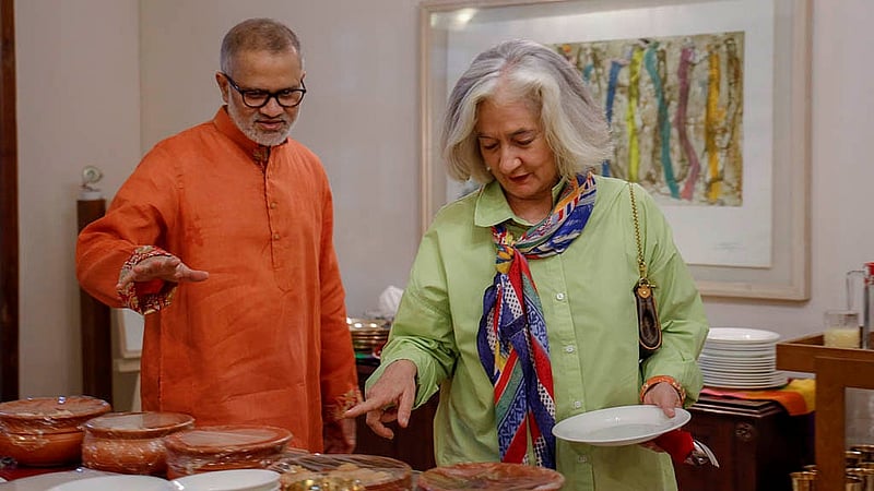 bdnews24.com Editor-in-Chief Toufique Imrose Khalidi briefing curious French Ambassador Marie Masdupuy about the Boishakhi delicacies.