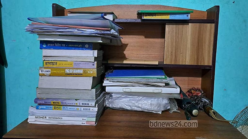 This is the table where Nafisa used to study; her books are still neatly arranged. Her handwritten biology notes are still posted on the wall.
