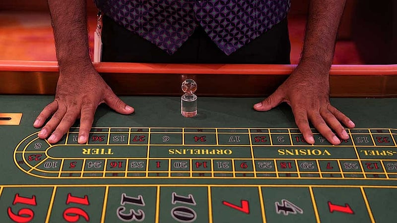A casino dealer stands at a Roulette table inside a casino at City of Dreams, an integrated resort that includes Sri Lanka's first high end casino, in Colombo, Sri Lanka, Aug 25, 2025. REUTERS
