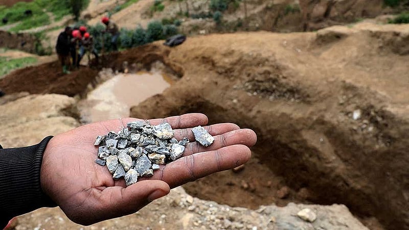 FILE PHOTO: A miner shows coltan in Birambo, Masisi territory, North Kivu Province of Democratic Republic of Congo, December 1, 2018. REUTERS