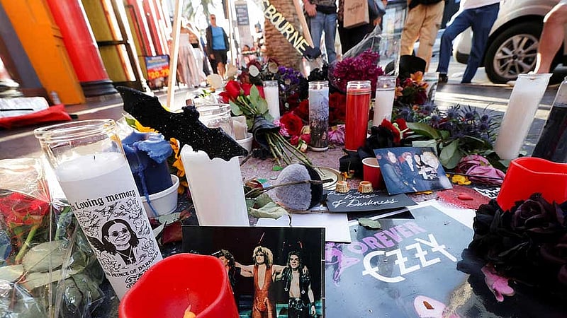 Flowers and candles are placed on the star of late Ozzy Osbourne at the Hollywood Walk of Fame in Los Angeles, California, US, Jul 22, 2025. REUTERS/Mario Anzuoni