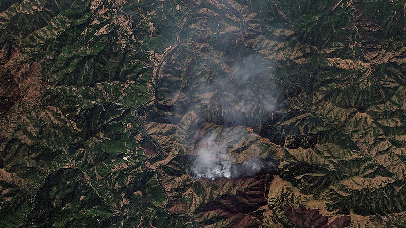 A satellite image shows plumes of smoke rising from a wildfire near Kraljevo, Raska District, Serbia, Aug 20, 2026. 2026 Planet Labs PBC/Handout via REUTERS 