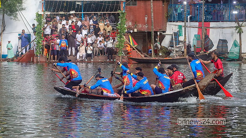 A boat race is held at Nawabbari Pond in Old Dhaka’s Islampur. Photo: Abdullah Al Momin