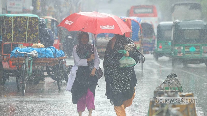 City dwellers rush to their destinations with umbrellas overhead as seen in Dhaka's Rampura on the afternoon of Monday, Aug 3, 2026. Photo: Shamsul Haque Ripon