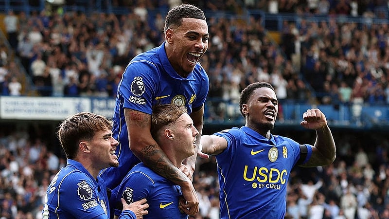 Football - Premier League - Chelsea v Brighton &amp;amp; Hove Albion - Stamford Bridge, London, Britain - August 30, 2026 Chelsea's Cole Palmer celebrates scoring their fourth goal with Morgan Rogers, Jorrel Hato and Pep Chavarria REUTERS