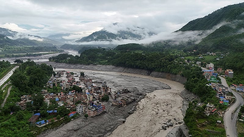 A drone view shows mud covering properties following a flash flood in Trishuli, Nuwakot district, Nepal, Aug 27, 2026. REUTERS/Navesh Chitrakar