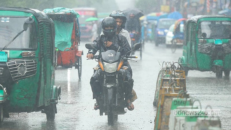 With Sraban nearing its end, rain poured over Dhaka on the afternoon of Monday, Aug 3, 2026. Ynprepared, this motorcyclist was forced to get drenched. Photo: Shamsul Haque Ripon