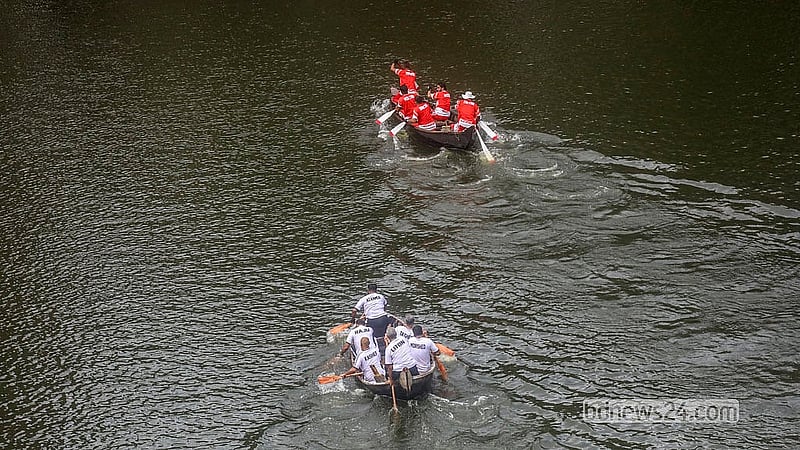 A boat race is held at Nawabbari Pond in Old Dhaka’s Islampur. Photo: Abdullah Al Momin