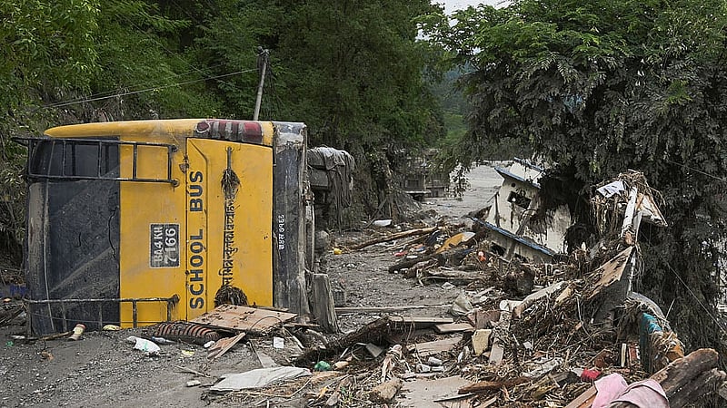 A school bus near Trishuli River flipped and covered in mud, following deadly flash floods and a mudslide, in Betrawati Bazaar in Rasuwa district, Nepal, Aug 30, 2026. REUTERS/Stringer