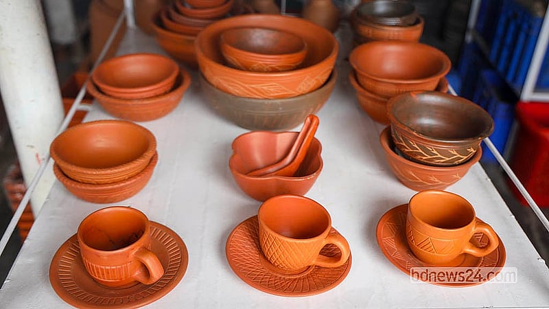 Modern designs are breathing new life into traditional pottery. At a shop in Dhaka’s South Keraniganj, clay cups, mugs and lidded vessels in contemporary designs are neatly lined up for sale.  Photo: Shamsul Haque Ripon