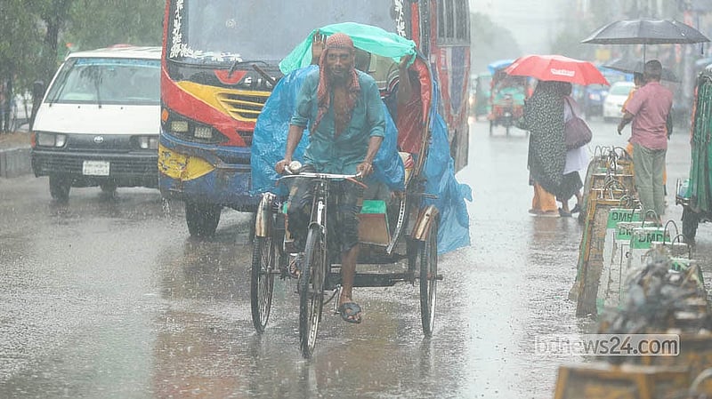 A rickshaw-puller drenched in rain rushes onward with a passenger in this photograph taken in Dhaka's Rampura on the afternoon of Monday, Aug 3, 2026. Photo: Shamsul Haque Ripon