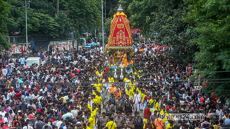 A vibrant procession sets off from Dhakeshwari National Temple to mark the return chariot festival on Friday, Jul 24, 2026. Photo: Abdullah Al Momin