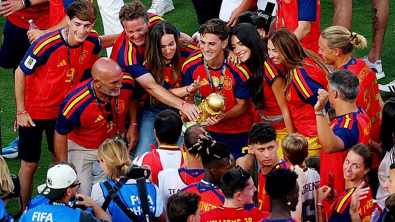 FIFA World Cup 2026 - Final - Spain v Argentina - New York/New Jersey Stadium, East Rutherford, New Jersey, US - Jul 19, 2026 Spain's Gavi with the World Cup trophy as he celebrates with members of his family REUTERS/Mike Segar