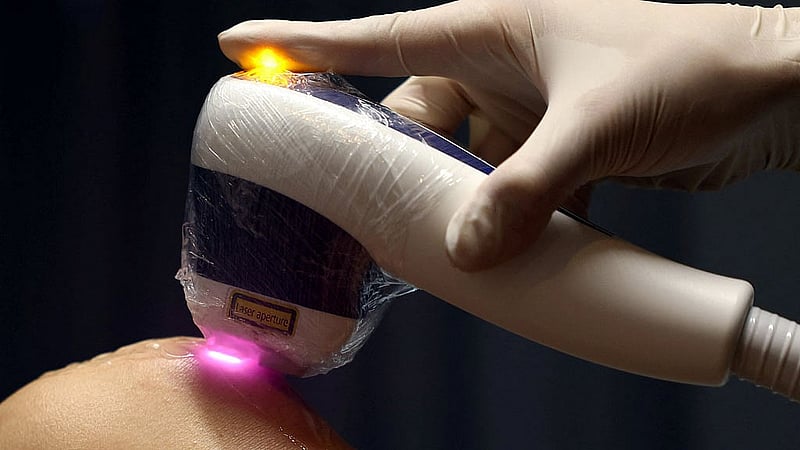 Yuki Kubo, 24, receives a leg hair removal treatment at Gorilla Clinic, a men's beauty clinic, in Tokyo, Japan Aug 19, 2026. REUTERS/Issei Kato