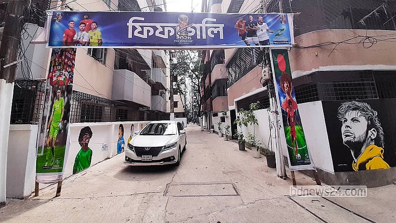A lane at RK Mission Road in Tikatuli has been named “FIFA Goli” by local football enthusiasts, who have painted murals of international football stars on the walls before the World Cup. Photo: Abdullah Al Momin
