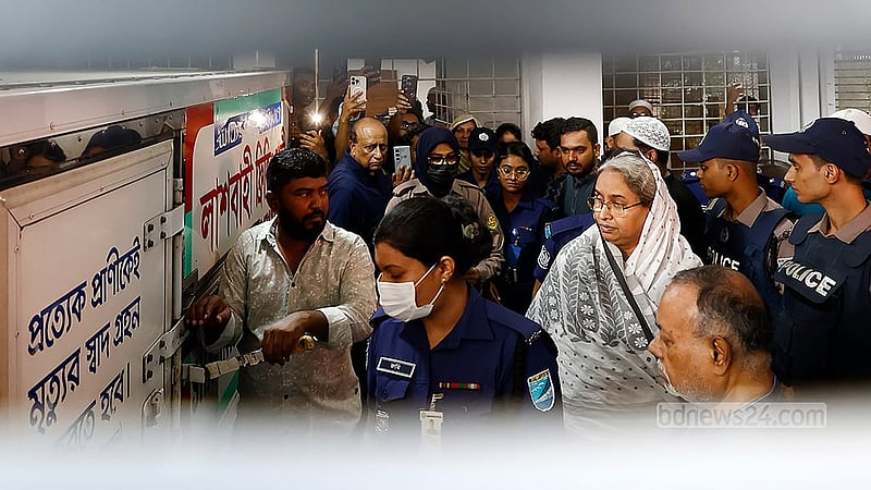 Former minister Dipu Moni stands beside the body of her husband, Supreme Court lawyer Tawfique Nawaz, at their Kalabagan home on the morning of Thursday, Aug 20, 2026. Photo: Shamsul Haque Ripon