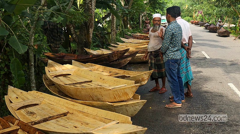 Boats are also displayed along the roadside for sale.  Photo: Shamsul Haque Ripon