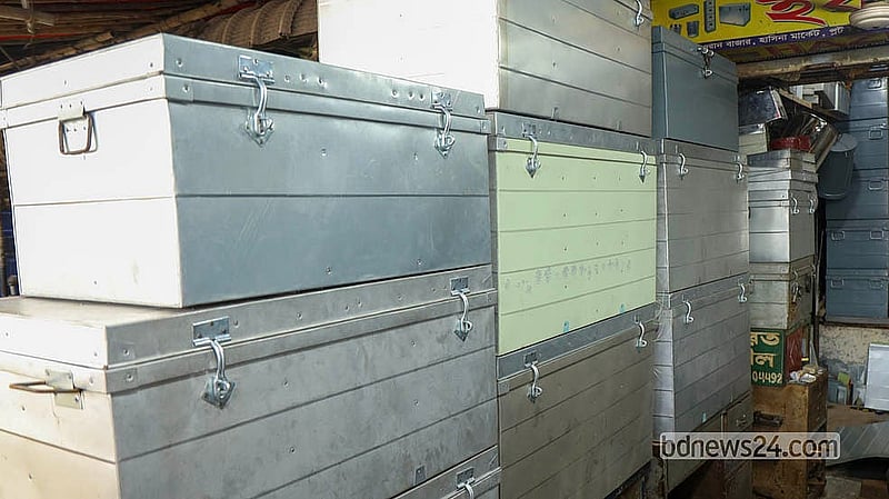 Tin trunks sell for between Tk 1,100 and Tk 8,000 in Karwan Bazar, depending on size and quality.  Photo: Shamsul Hoque Ripon