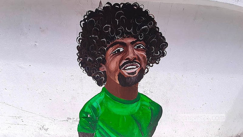 Alongside international stars, images of Bangladesh footballer Hamza Choudhury are also painted on walls at “FIFA Goli” on RK Mission Road in Dhaka’s Tikatuli. Photo: Abdullah Al Momin