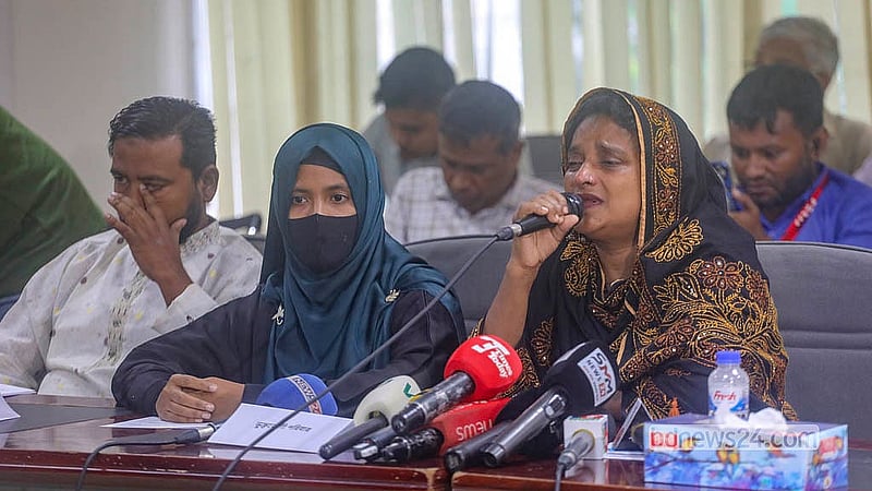 Nasima Begum, wife of Mizan Jamaddar, a BNP activist from Rajapur in Jhalakathi who fell victim to enforced disappearance, attends a discussion at the National Press Club on Saturday, Aug 29, 2026. Photo: Abdullah Al Momin