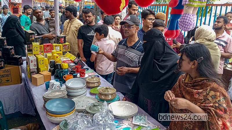 A fair is organised around the boat race at Nawabbari Pond in Old Dhaka’s Islampur. Photo: Abdullah Al Momin