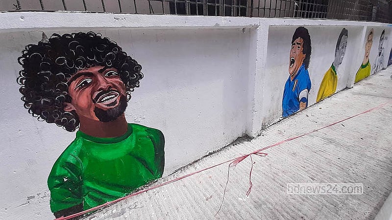 Alongside international stars, images of Bangladesh footballer Hamza Choudhury are also painted on walls at “FIFA Goli” on RK Mission Road in Dhaka’s Tikatuli. Photo: Abdullah Al Momin