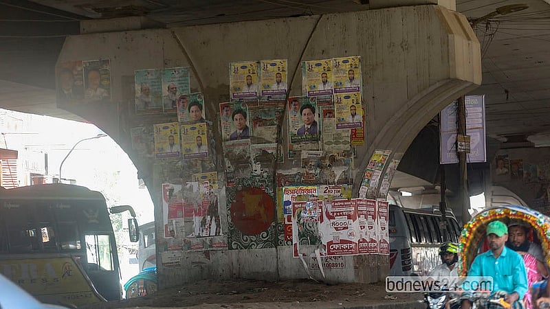 Posters cover graffiti painted by students and members of the public on pillars under the Mayor Hanif Flyover in Jatrabari during the July Uprising. Photo: Abdullah Al Momin