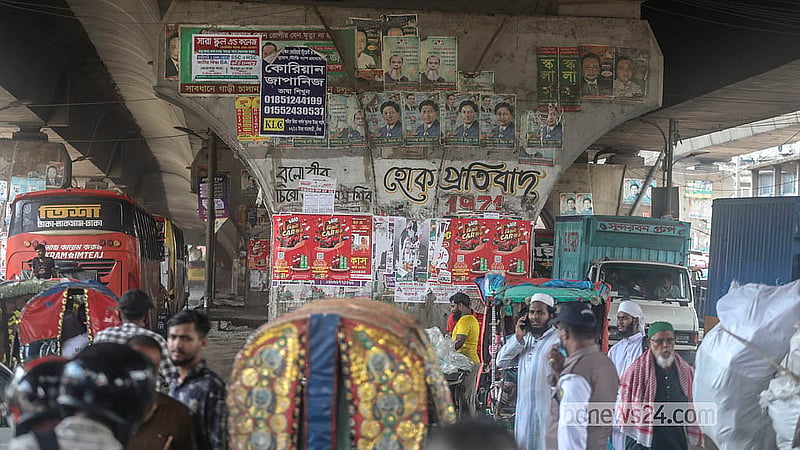 Posters cover graffiti painted by students and members of the public on pillars under the Mayor Hanif Flyover in Jatrabari during the July Uprising. Photo: Abdullah Al Momin
