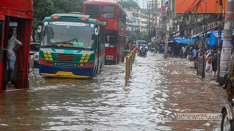 Waterlogging grips the Daily Bangla intersection after persistent rain lashed the capital on Sunday, Jul 12, 2026.  Photo: Abdullah Al Momin