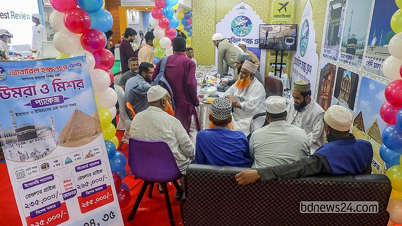 Agency staff explain the benefits of different Hajj and Umrah packages to visitors at the fair.   Photo: Abdullah Al Momin