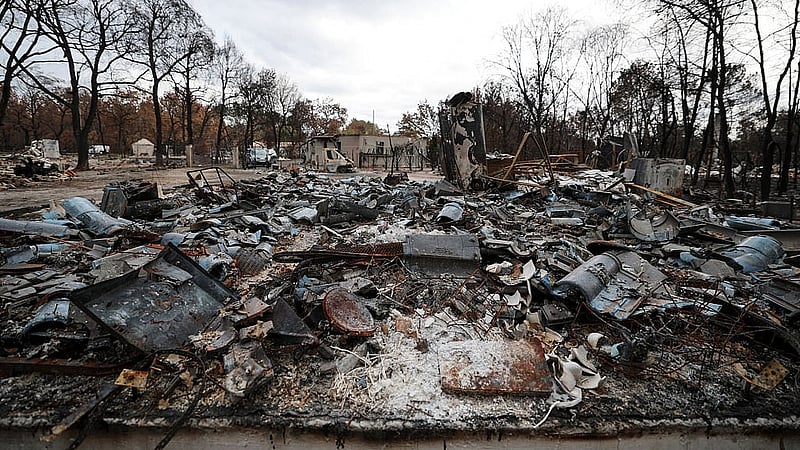 The remains of Nathalie Beigbeder-Calay's home, which was destroyed in the July wildfires, in Le Porge, Gironde, France, Aug 19, 2026. REUTERS/Photographer Name