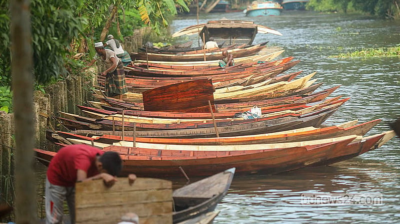 Wooden boats are lined up for sale at the traditional boat market on the Kuriana Canal in Nesarabad, Pirojpur.  Photo: Shamsul Haque Ripon