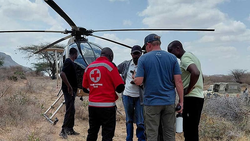 Rescue officials work at the site of a tourist helicopter crash that caused multiple casualties, according to the police, in Samburu County, Kenya, Aug 19, 2026. Photo: Reuters