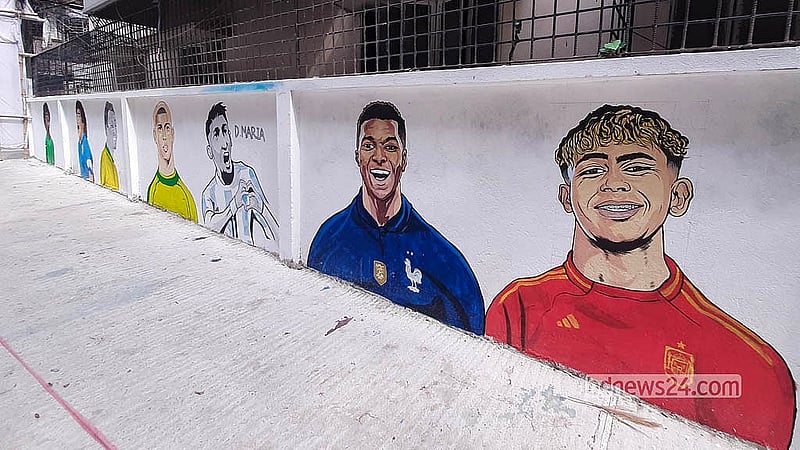 Murals of popular footballers are displayed along “FIFA Goli” on RK Mission Road in Dhaka’s Tikatuli before the FIFA World Cup. Photo: Abdullah Al Momin