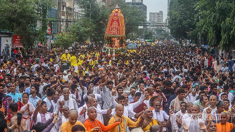 As the chariot reaches Motijheel from the Swamibag Ashram on Thursday, Jul 16, 2026, the road remains filled with devotees. Photo: Abdullah Al Momin