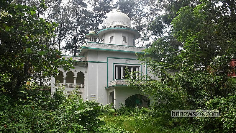 A replica of the High Court is almost swallowed by vegetation after years of neglect. Photo: Suman Babu