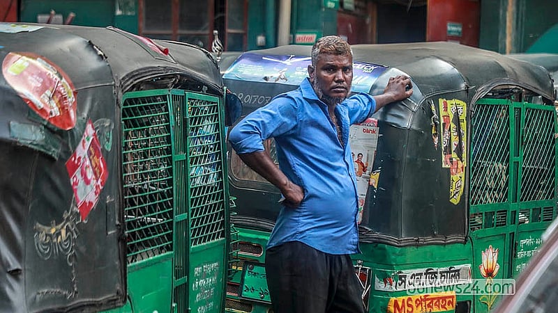 An autorickshaw driver waits at a Moghbazar filling station on Sunday, Sept 13, 2026 as low gas pressure hampers supply.   Photo: Abdullah Al Momin
