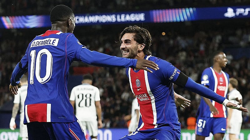 Football - UEFA Champions League - Paris St Germain v Slovan Bratislava - Parc des Princes, Paris, France – Sept  9, 2026 Paris St Germain's Ferran Torres celebrates scoring their fifth goal with Ousmane Dembele REUTERS