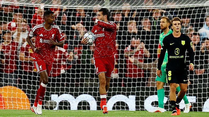 Football - UEFA Champions League - Liverpool v Atletico Madrid - Anfield, Liverpool, Britain - Sept 9, 2026 Liverpool's Dominik Szoboszlai celebrates scoring their first goal with Alexander Isak REUTERS