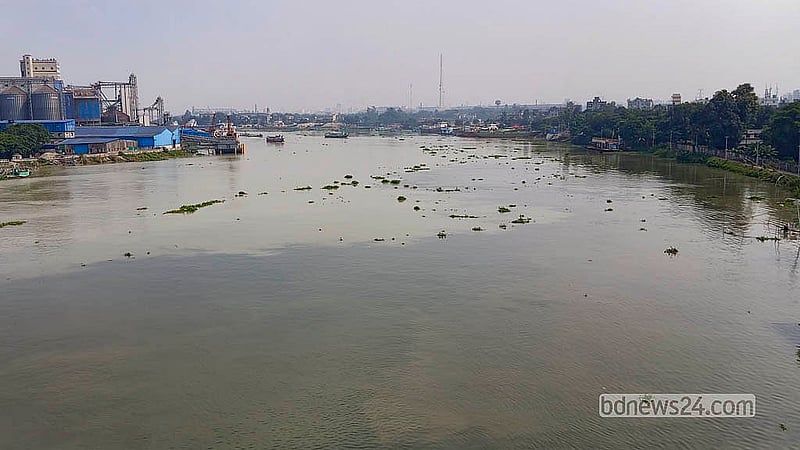 Black water mixed with waste from factories flows from the Balu River into the Shetalakshya River, as seen in this photo taken from Demra Bridge. Photo: Abdullah Al Momin